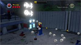 In game image of Lego Jurassic World on the Microsoft Xbox 360.